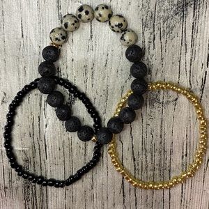 Dalmatian jasper and black lava rock bracelet